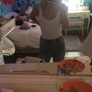 out from under white ribbed bodysuit